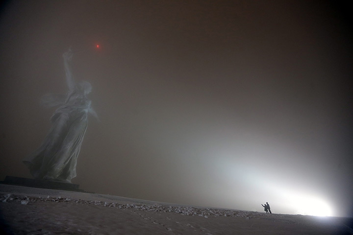 Photo highlights: Volgograd, Russia: The Motherland Calls monument in thick fog at the Mamaye