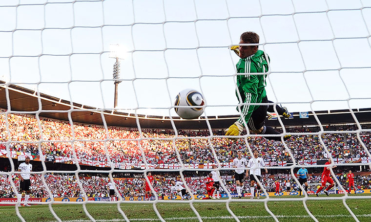 old players: Germany's goalkeeper Manuel Neuer eyes the ball