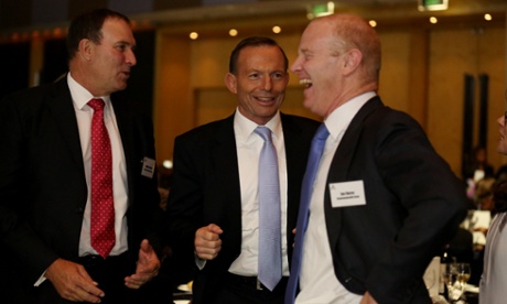 Tony Abbott speaks to Fortescue Metal CEO Nev Power and Commonwealth Bank CEO Ian Narev at the Business Council of Australia 30th Anniversary Dinner in Sydney.