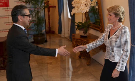 Foreign minister Julie Bishop is greeted by her Indonesian counterpart Marty Natalegawa.