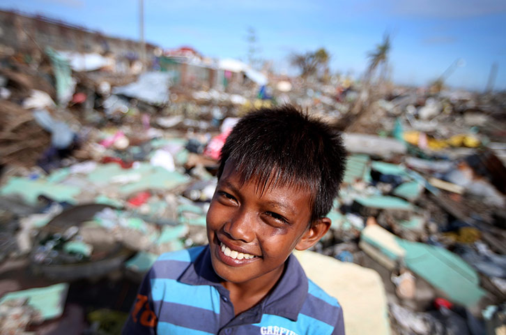 Joshua Cator: Joshua smiles while standing in the spot where his picture was first taken