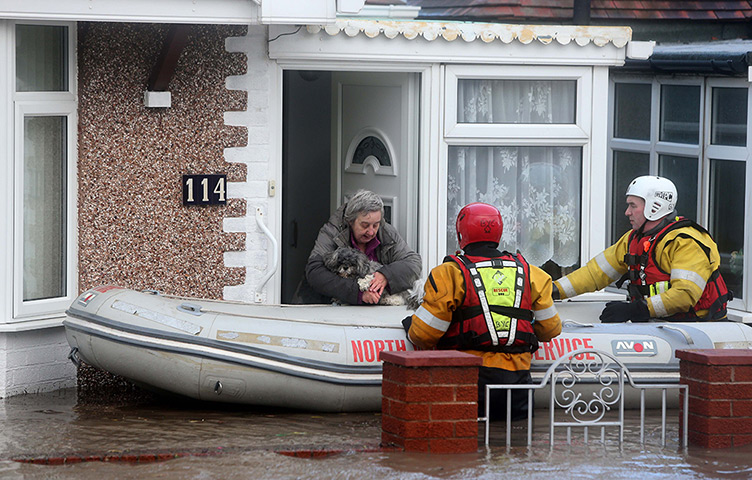 UK weather: People are rescued by the RNLI from the floods in Rhyl 