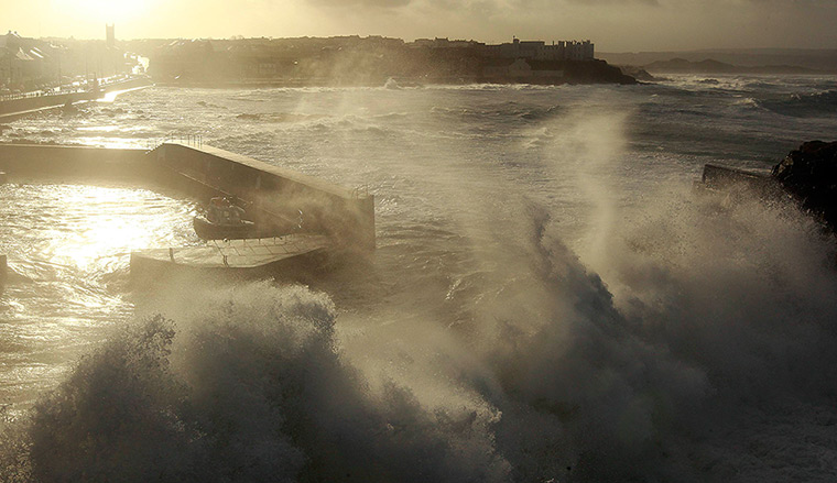 Uk weather: Waves crash against Portstewart Harbour as gale force winds hit the the nor