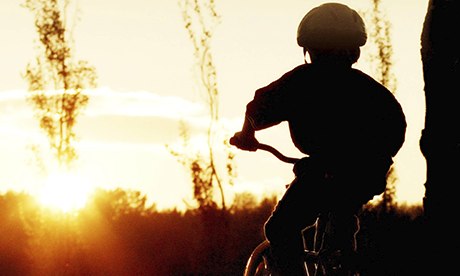 child on bike