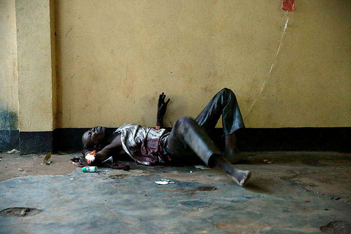 20 Photos: Wounded man lies unattended in a Bangui mosque