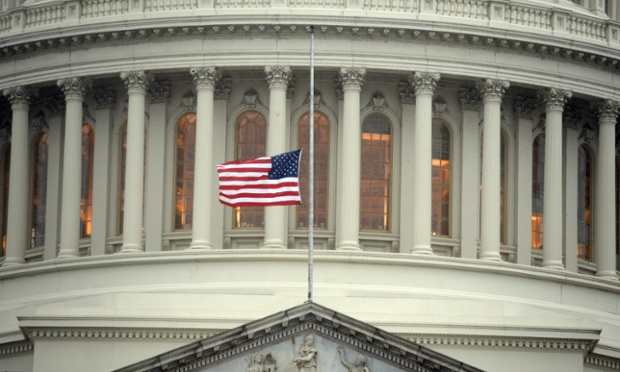 The US flag flies at half mast at the Capitol in Washington DC.