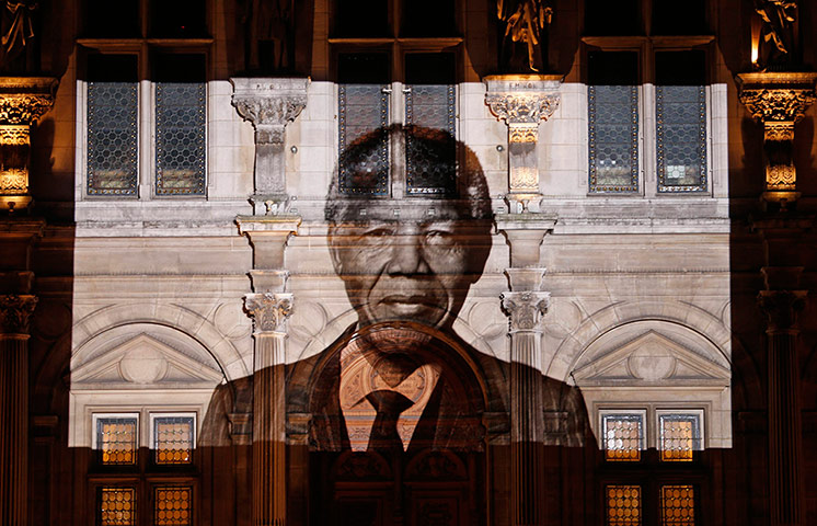 20 photos: Nelson Mandela is projected on Paris town hall