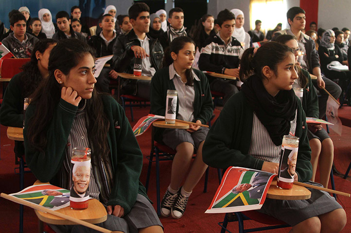 Celebrate Nelson: Lebanese students with South Africa flags