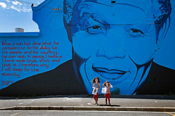 Celebrate Nelson: India Harris, and her sister Kitty, next to a mural