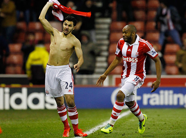 Prem Roundup: Oussama Assaidi celebrates scoring the third goal for Stoke with Wilson Pal