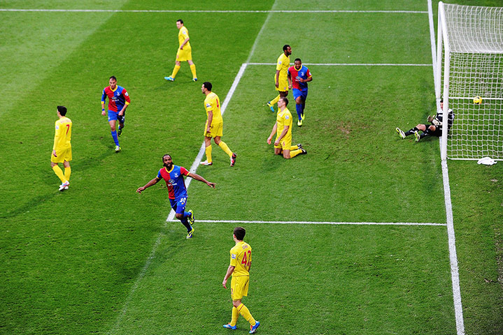 Prem Roundup: Cameron Jerome of Crystal Palace celebrates scoring past David Marshall the
