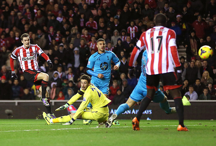 Prem Roundup: Sunderland's English midfielder Adam Johnson scores the opening goal agains