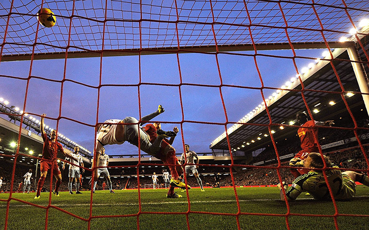 Prem Roundup: Mamadou Sakho of Liverpool scores the second goal against West Ham