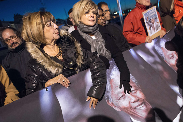 Celebrating Mandela people hold a banner Vieux-Port in Marseille, southern France