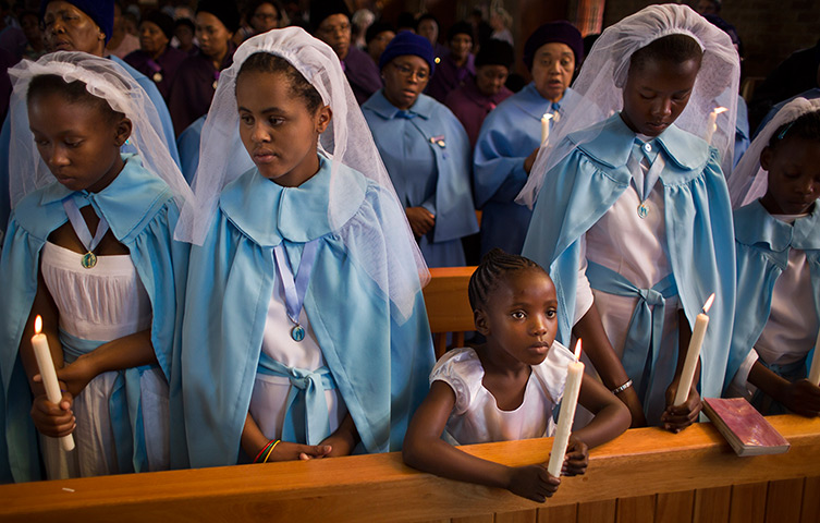 Weekend in pictures: Soweto, Johannesburg, South Africa: Young members of the choir attend a mor