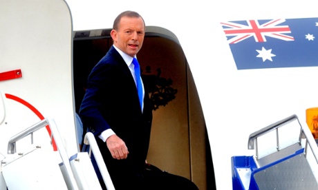 Prime Minister Tony Abbott and opposition leader Bill Shorten leave for South Africa in Canberra, Monday, Dec. 9, 2013. They will attend a memorial service for former South Africa president Nelson Mandela.