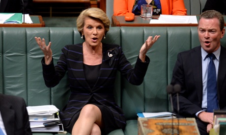 Foreign Minister Julie Bishop and education minister Chris Pyne react during question time in the House Of Representatives chamber at Parliament House Canberra Monday, Dec. 9, 2013. AAPIMAGE for The Guardian/Alan Porritt