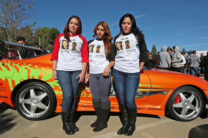 Paul Walker memorial: Fans wear shirts commemorating Paul Walker and Roger Rodas