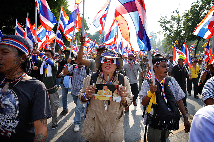 Thai protests: Protesters march outside Government house