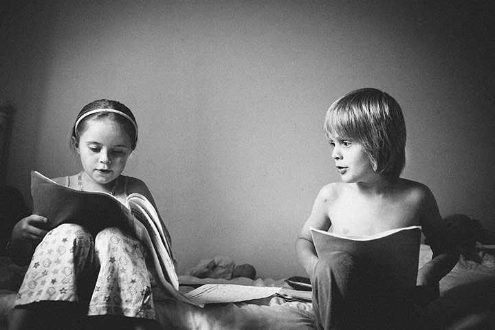 Your Pictures - Prepare: black and white picture of boy and girl reading 