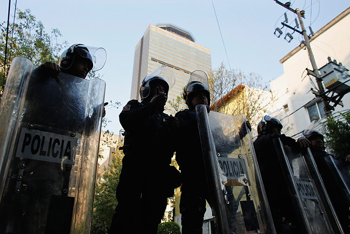 Mexico explosion: Police block a street leading to the headquarters of state oil giant Pemex