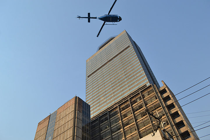 Mexico explosion: A helicopter flies over the building