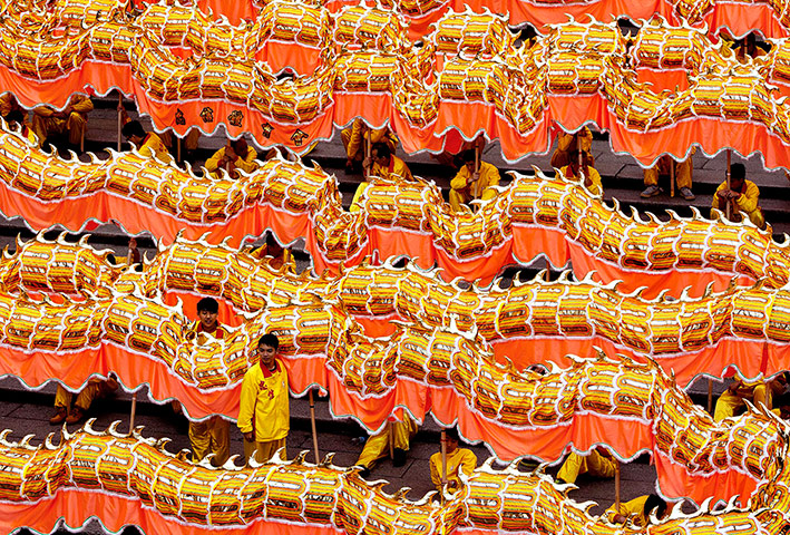 Chinese New Year: A 238 metre long golden dragon in Macau, China