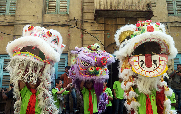 Chinese New Year: Members of the Chinese community in Kolkata, India, perform a lion dance