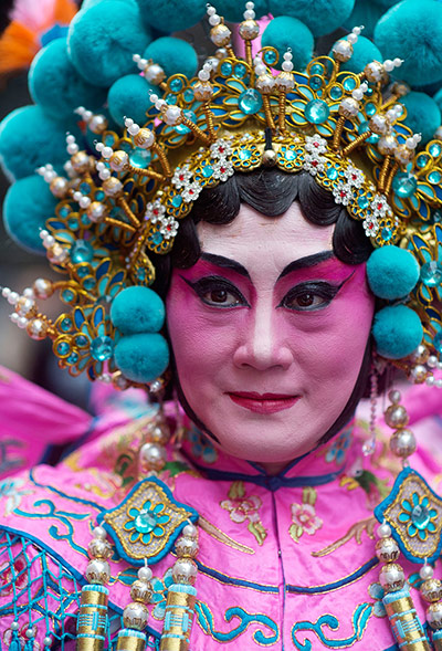 Chinese New Year: A traditional dancer in London's Chinese New Year parade 
