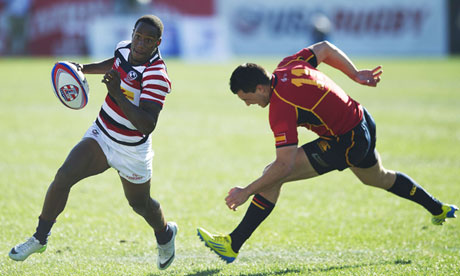 Carlin Isles evades Julen Goia Iriberri of Spain at the USA Sevens in Las Vegas