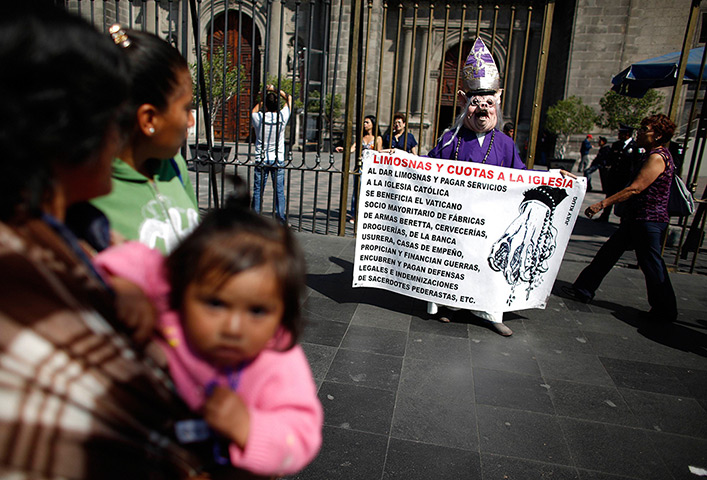 24 hours: Mexico City, Mexico: A woman protests against the Catholic clergy
