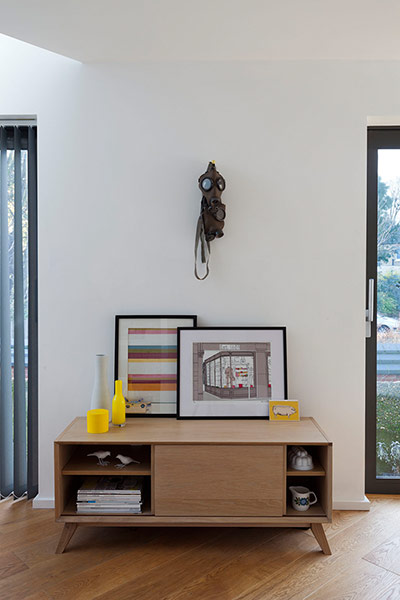 Homes - Lewisham NB: wooden sideboard against a white wall