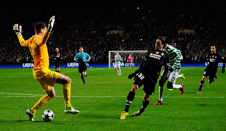 Tuesday Champions League: Alessandro Matri of Juventus shoots past Fraser Forster of Celtic