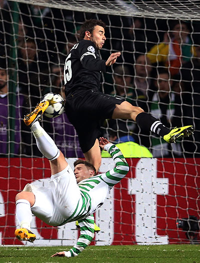 Tuesday Champions League2: Kris Commons tries an overhead kick