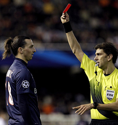 Tuesday Champions League2: Referee Paolo Tagliavento shows the red card to Zlatan Ibrahimovic