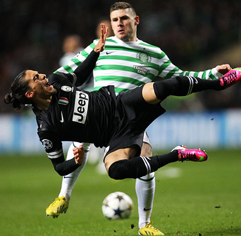 Tuesday Champions League3: Martin Caceres comes off worst in a tussle with Gary Hooper 