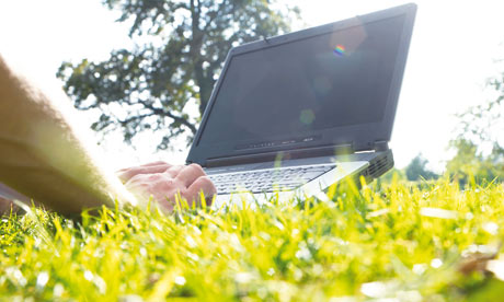 laptop working in a park