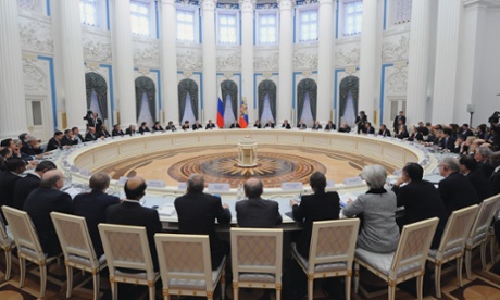Vladimir Putin speaks to G20 finance chiefs in the Kremlin in Moscow today. Can you match the back of the head to the country?