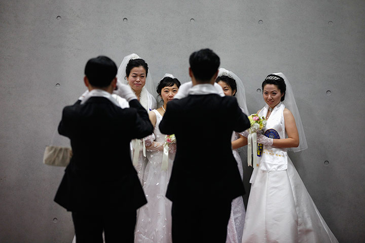 Guardian Camera Club: Newlyweds take pictures at the centre