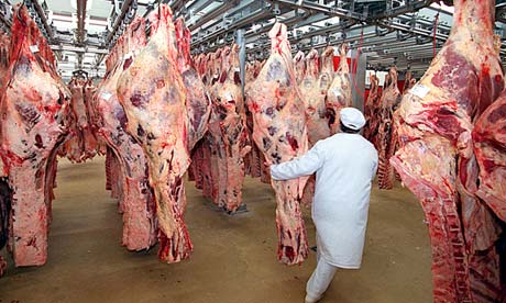 Beef carcasses at a wholesale meat market in Paris