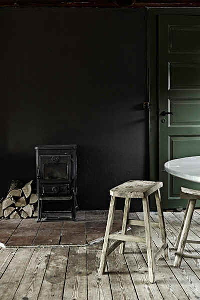 Homes - From Dawn to Dusk: wooden stool against olive green wall