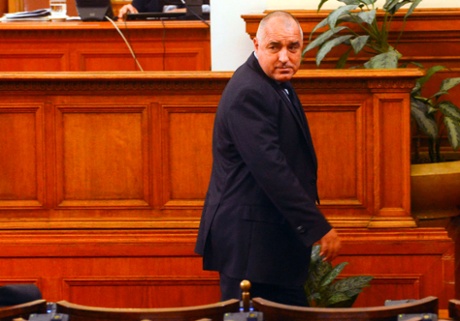 Bulgarian Prime Minister Boiko Borisov walks away after his speech in the Parliament in Sofia February 20, 2013.