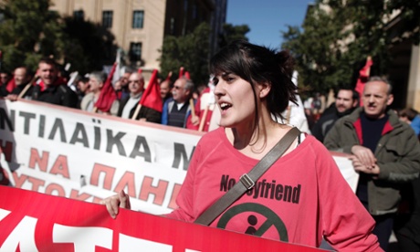 A member of pro-communist union PAME shouts slogans during a protest in Athens, Wednesday, Feb. 20, 2013.