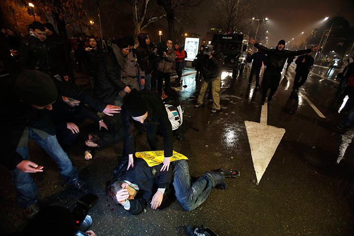 24 hours: Sofia, Bulgaria: Protesters lie on the ground after clashes 