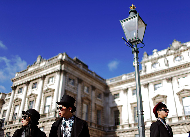 24 hours: London, England: Guests from Hong Kong wait outside Somerset House