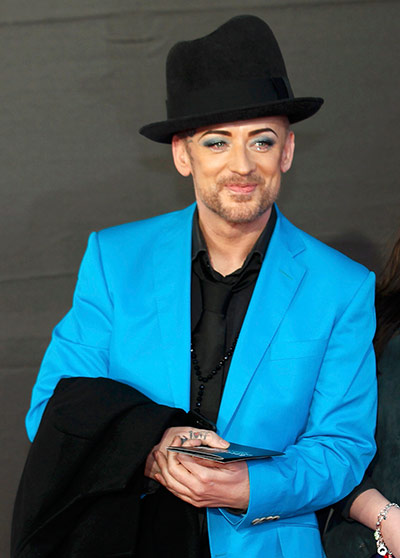 Brits 2013 red carpet: Singer Boy George arrives for the BRIT Awards at the O2 Arena in London