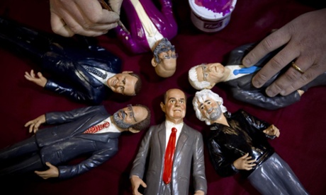 Figurines representing the main candidates of the upcoming Italian general election as Christmas crib shepherds are on display in a shop at San Gregorio Armeno in Naples, Italy, 21 February 2013.