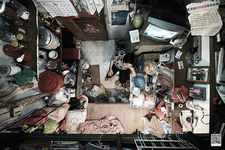 hong kong flats: A woman in her Hong Kong flat.