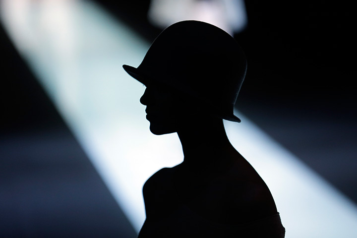 24 hours in pictures: A model on the catwalk during the Emporio Armani show at Milan fashion week