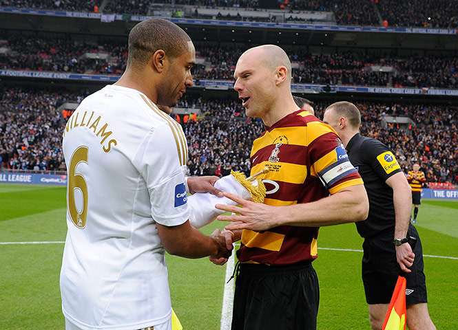 capital one final 2: Captains Ashley Williams and Gary Jones greet one another ahead of kick-off